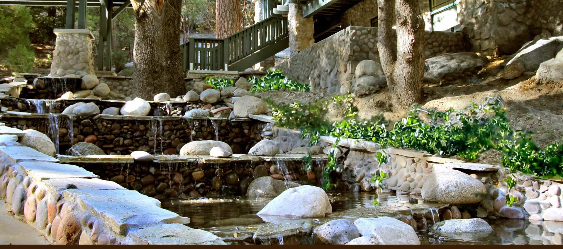 Grand Idyllwild Lodge front water feature