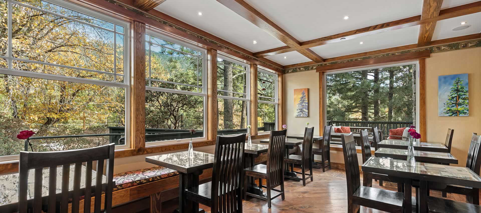 Grand Idyllwild dining room tables and chairs with mountain views