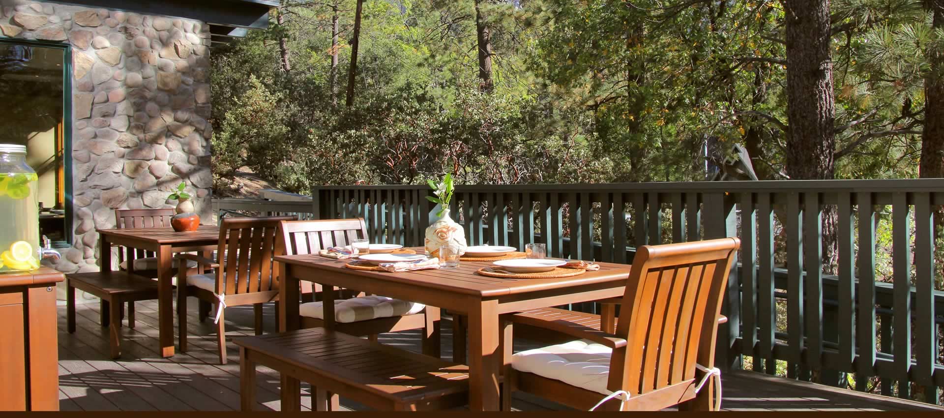 Grand Idyllwild Lodge deck with dining tables and chairs