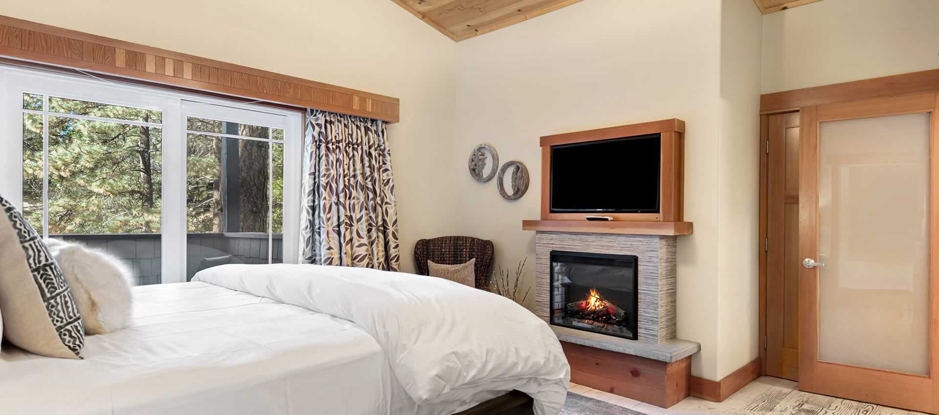 Tranquility room bed and fireplace