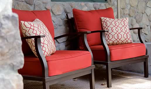 Sernerity room chairs with throw pillows on patio
